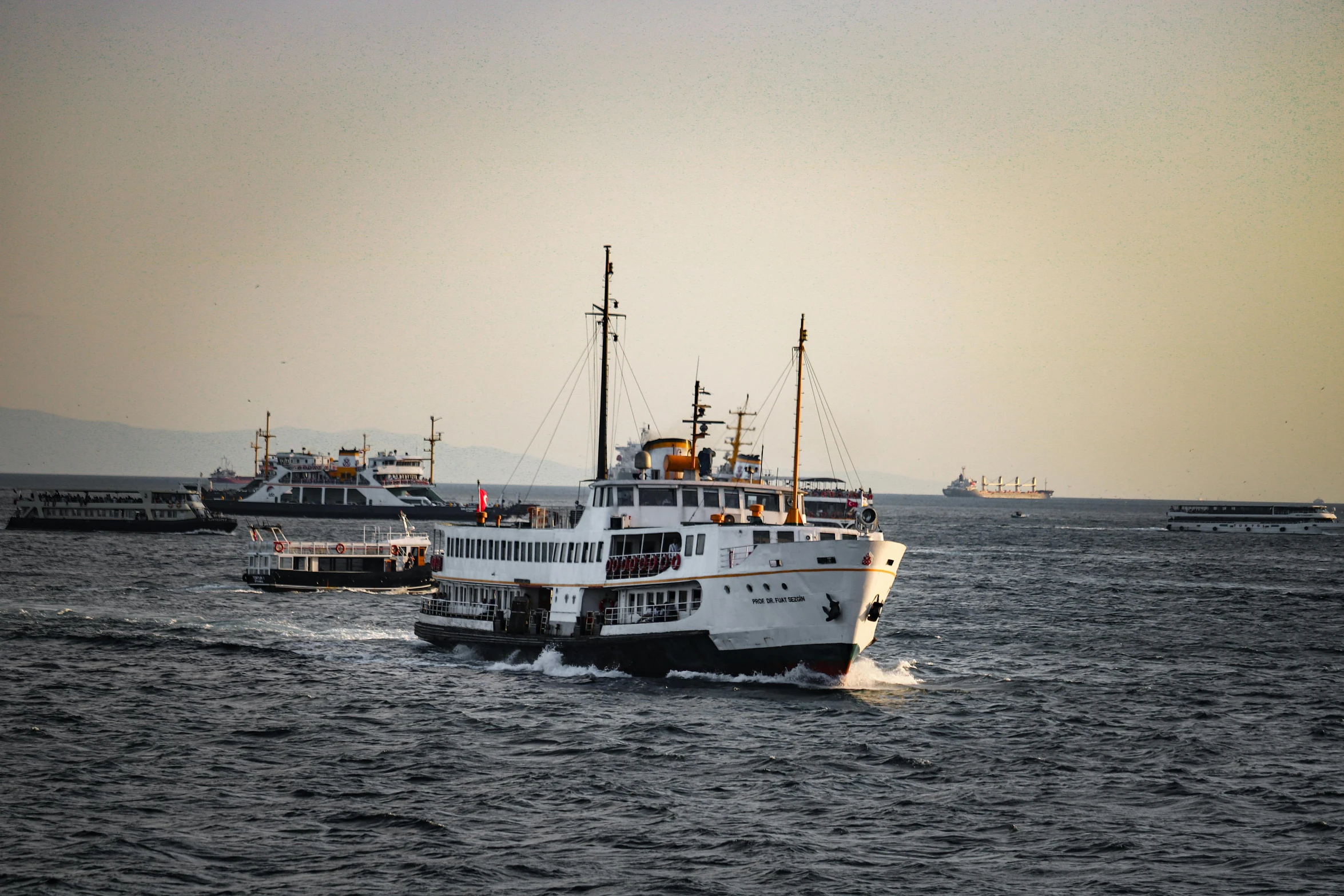 several boats out on the water near each other