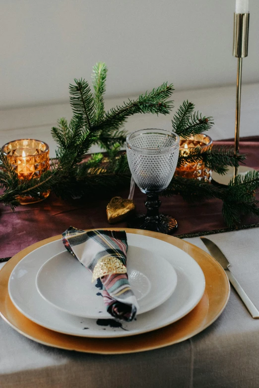 a white dinner plate sitting on top of a wooden table