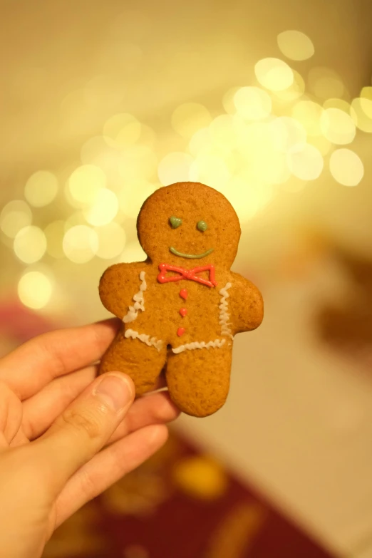 a ginger man is standing in the palm of someones hand