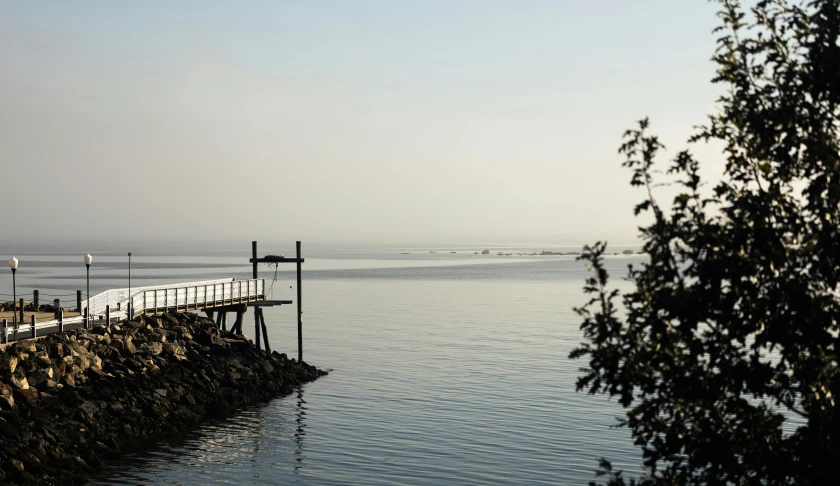 the view from the edge of the dock toward the water