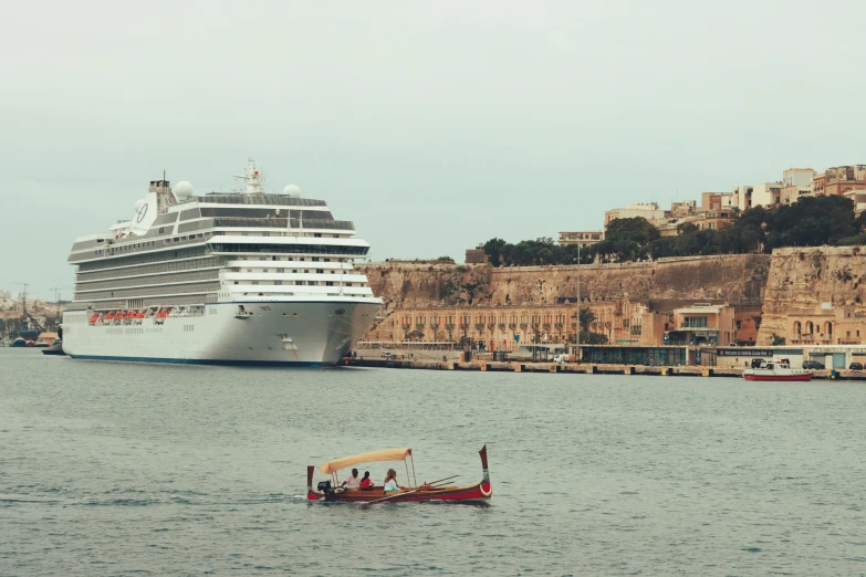 there are two gondolas that are being held up near the boats