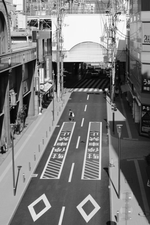 a view down the street with a lot of signs on it