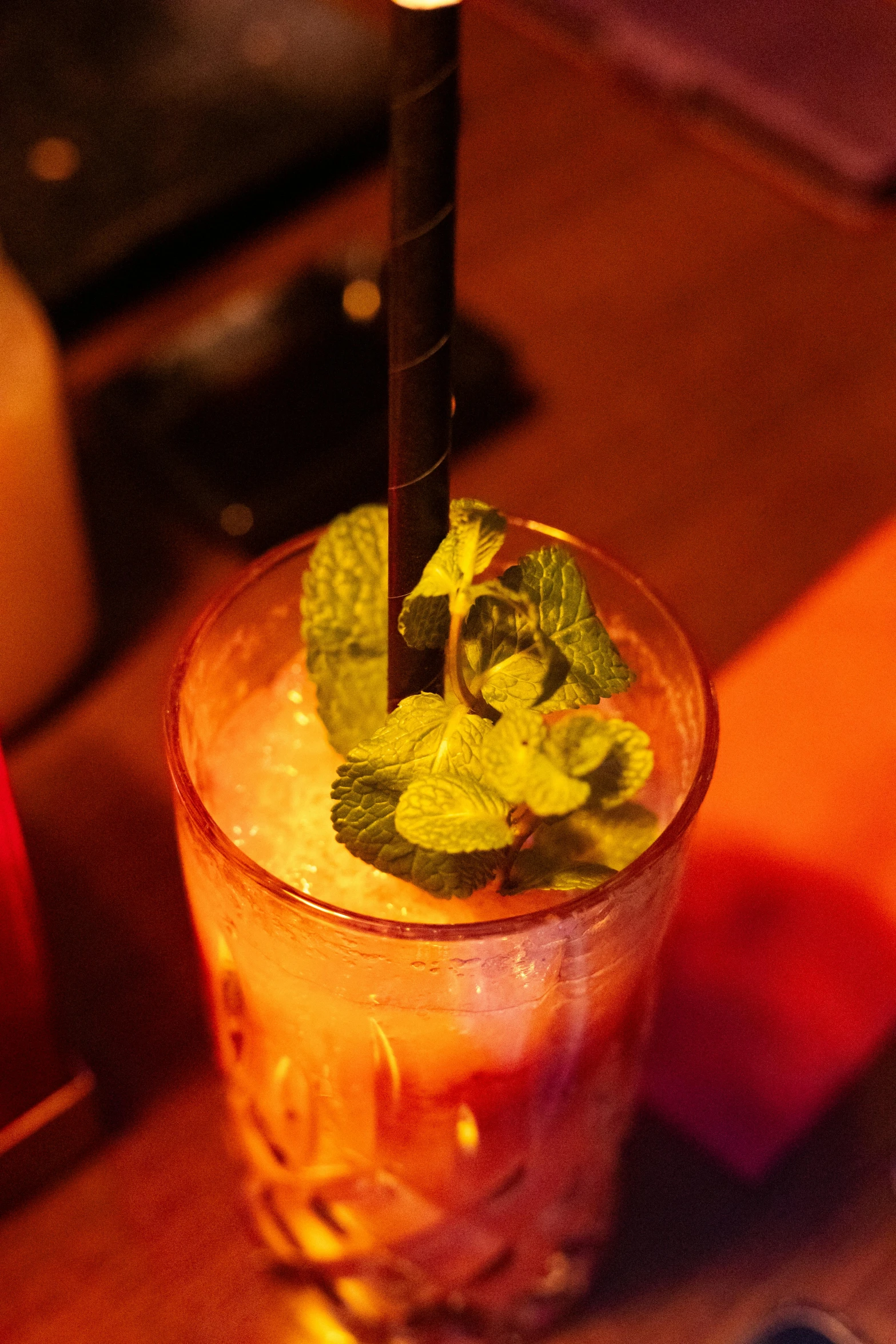 a cup with leaves and water in it