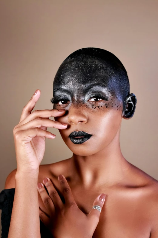 a woman has her head shaved while posing for a po