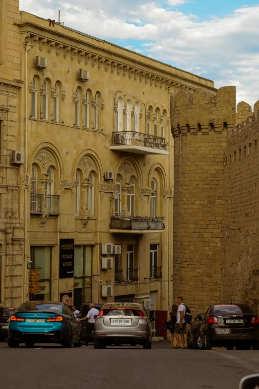 a few cars parked on the side of the street