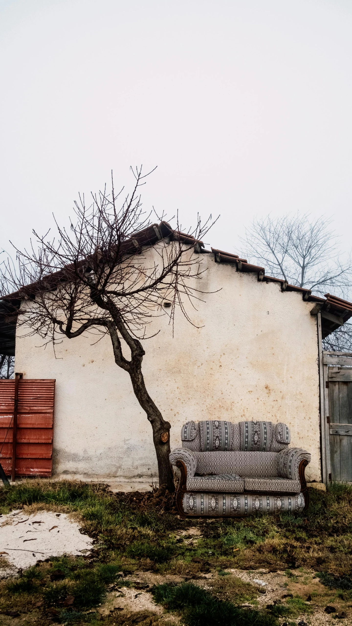 the house has two couches in front of it