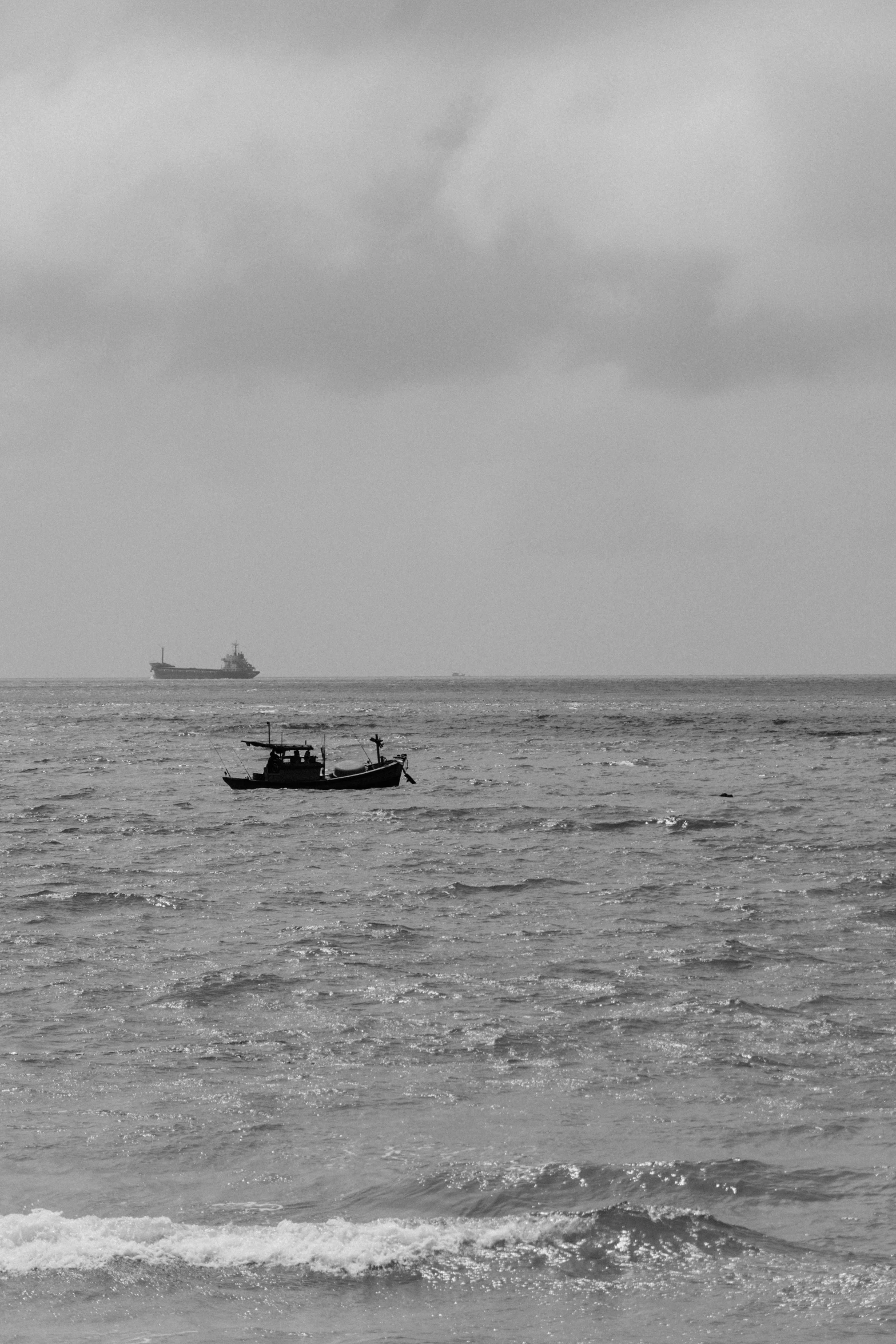 a boat sailing across a large body of water