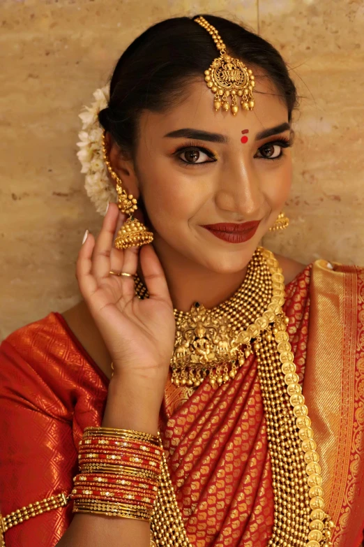 a woman with a bunch of jewelry around her neck