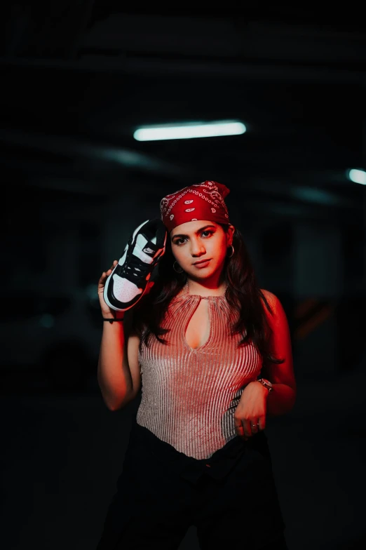 a woman wearing a pirate outfit while holding a glove