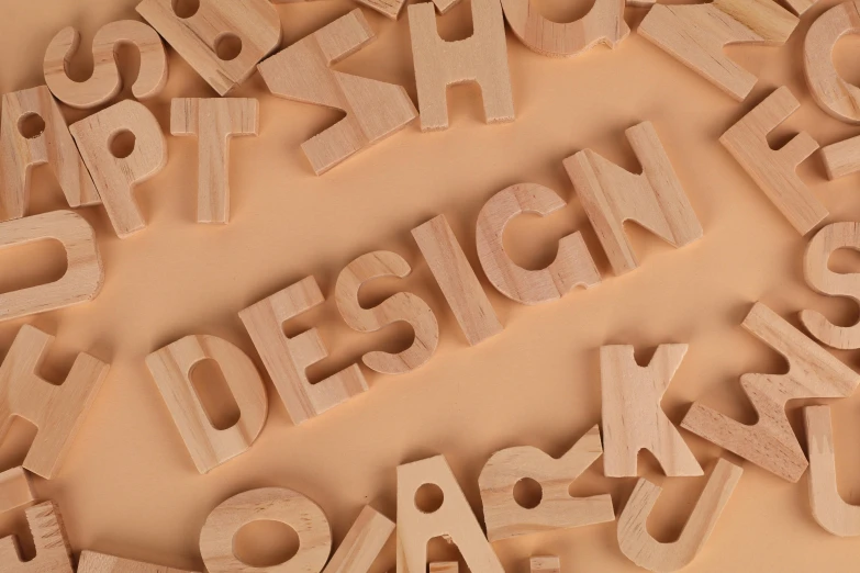wooden type is grouped together in the shape of letters