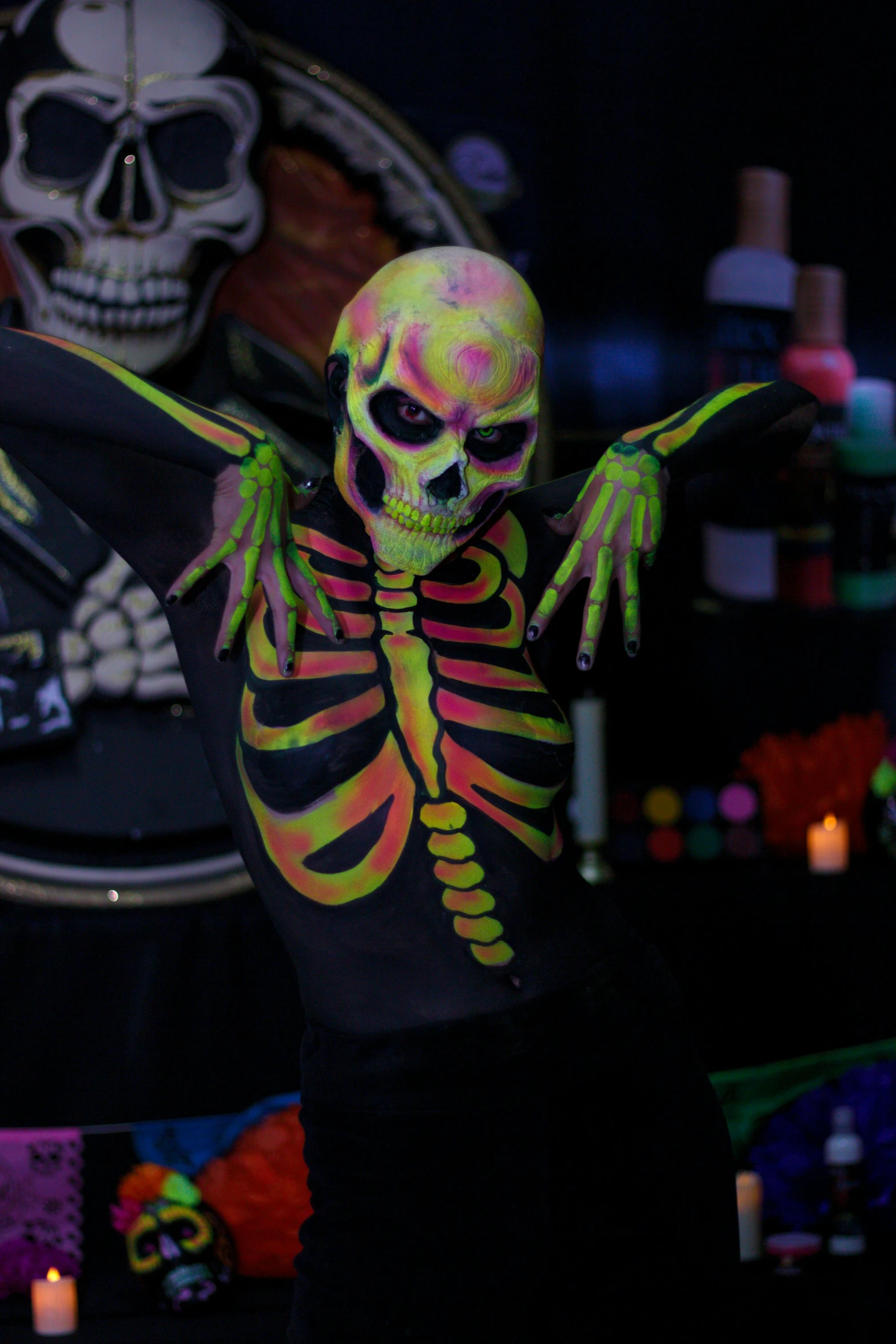 skeleton painted in black with arms out