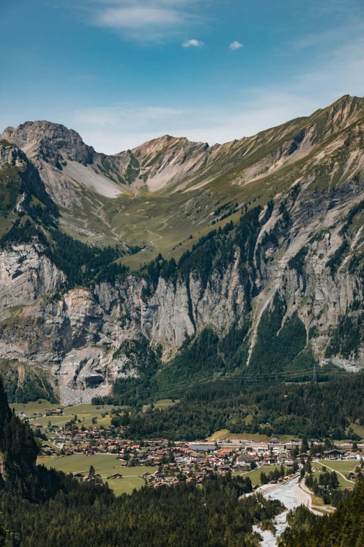 view of a city nestled among some mountains