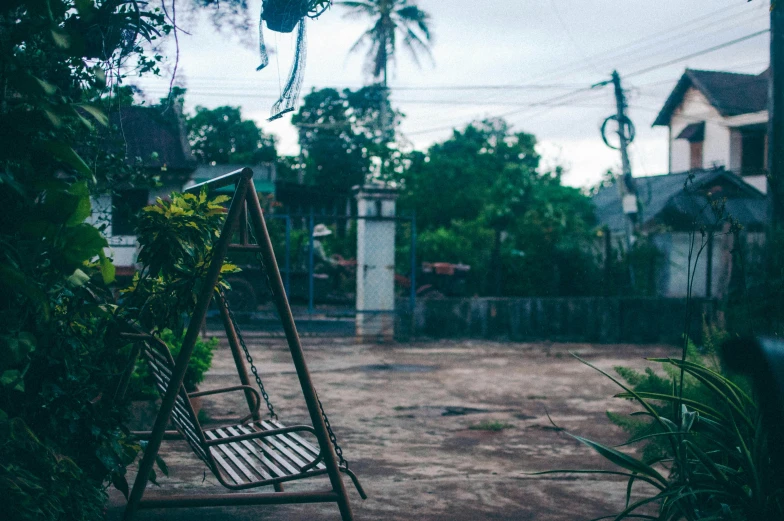 there are swings to swing around a small yard