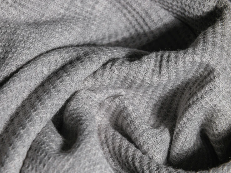 an image of grey textured material as the background