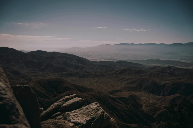 a mountain scene from top of a rock