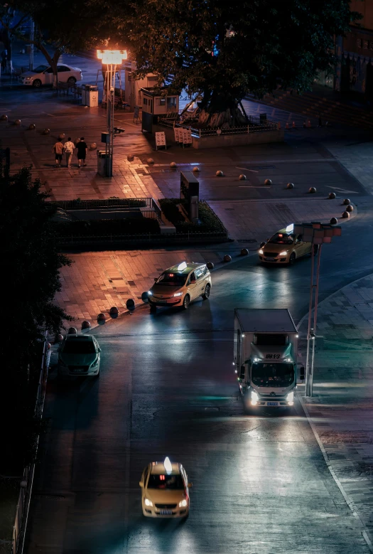 night view of city street with traffic and street lights