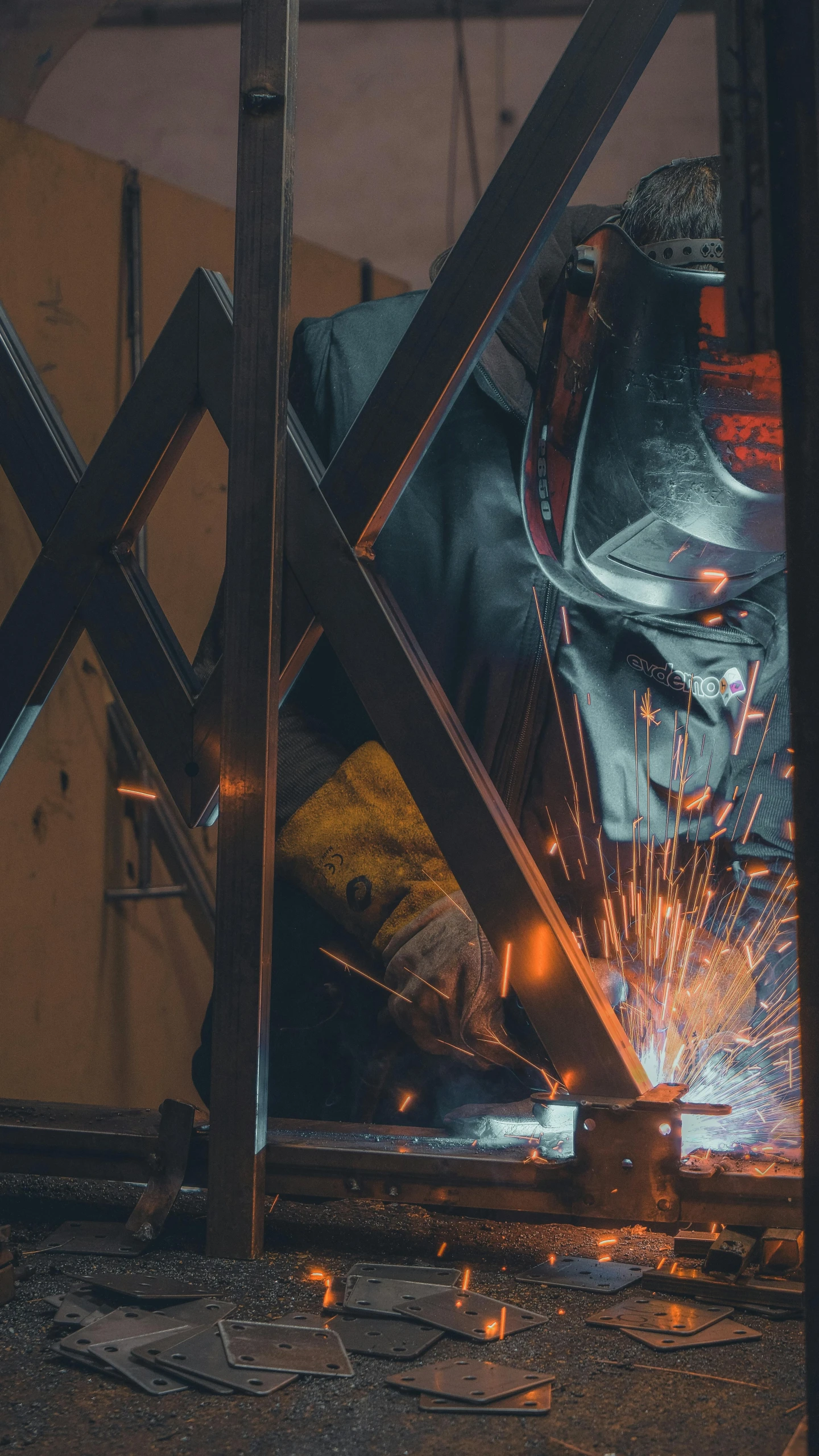 welder working in a metal factory producing new products