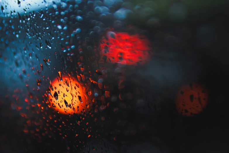 rain drops on a window during a rainy day