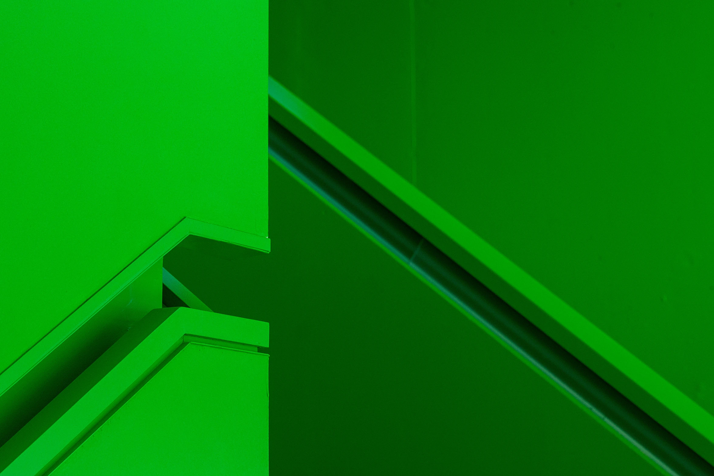 an abstract po of some slant lines on a green background