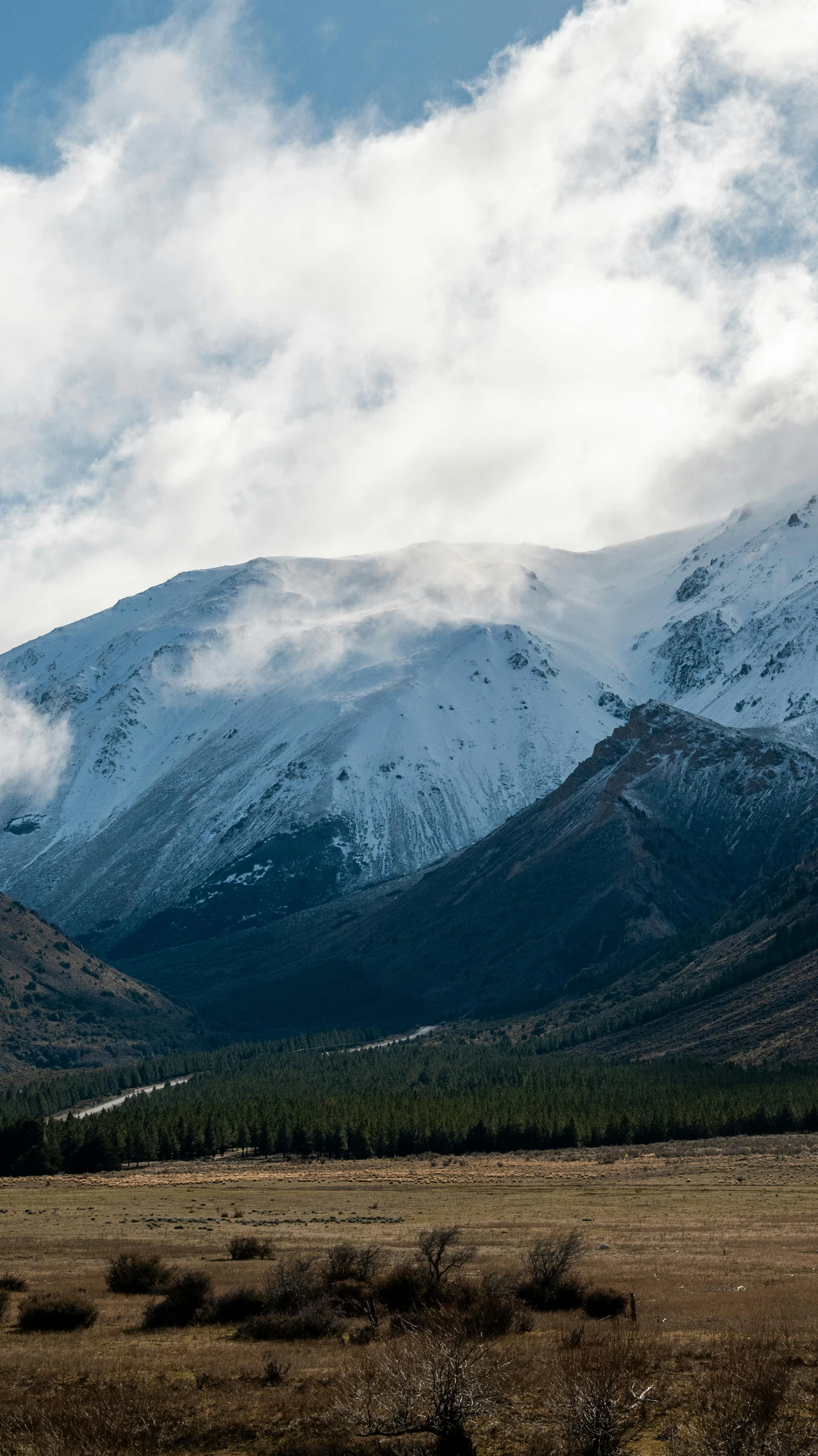 there is a mountain that has snow on it