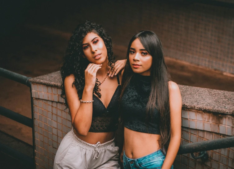 two women posing together for the camera