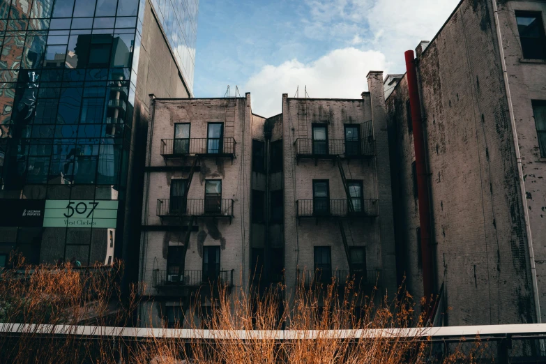 some buildings and a street sign in front of them