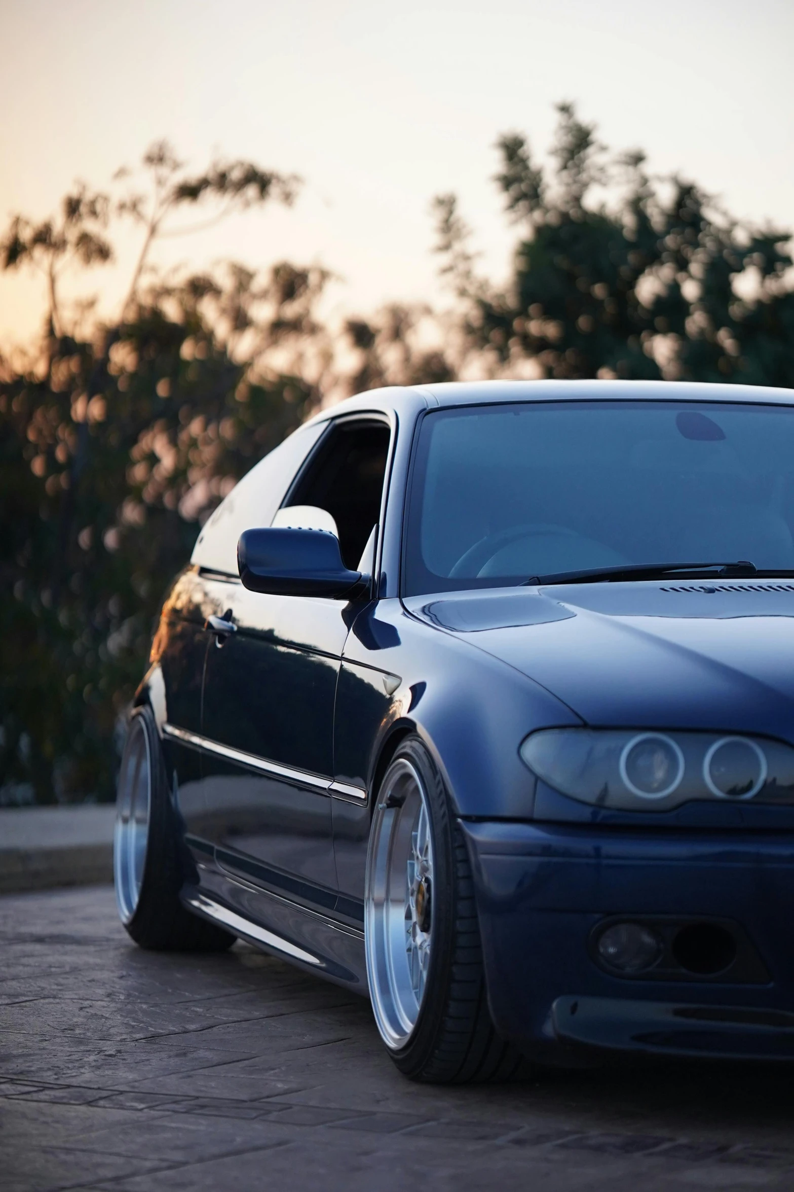 an artistic s of the front of a blue bmw