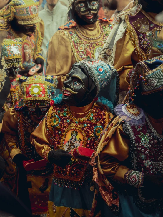 several people with painted face paint in costumes