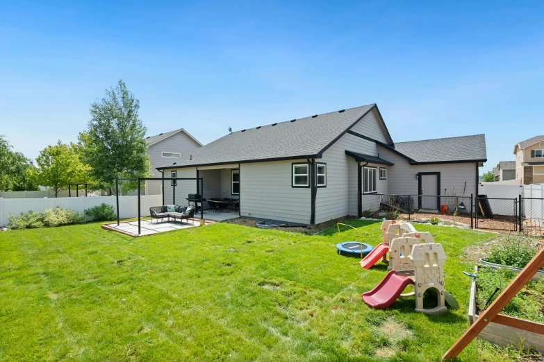 an old house with the backyard in view