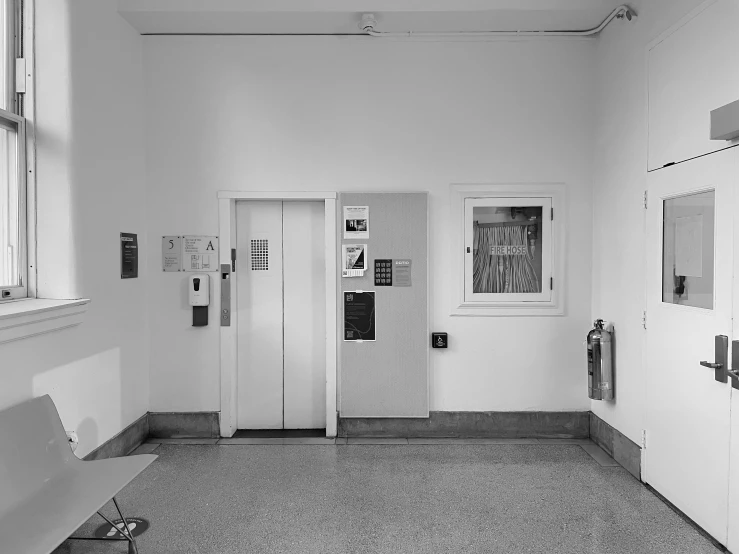 a line of empty doors in a building