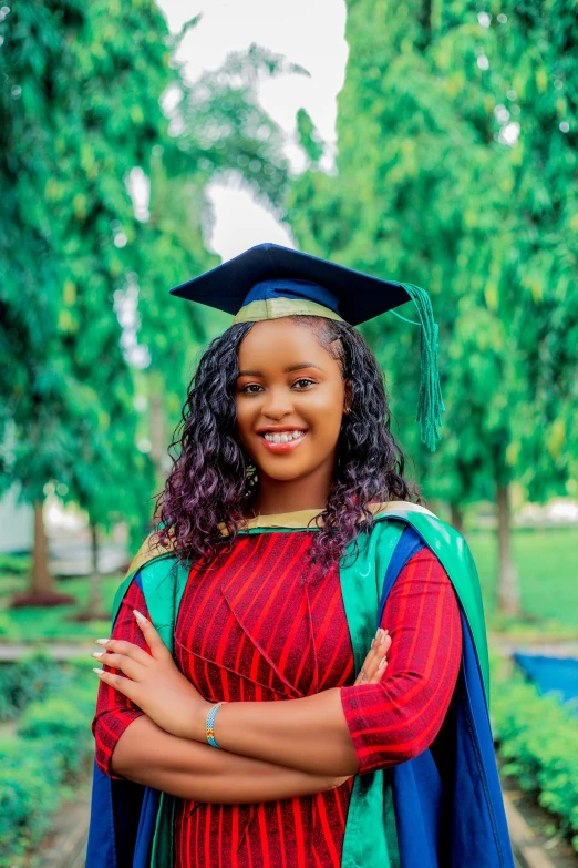 a  smiles while she is graduating