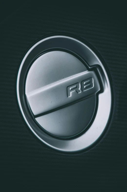 a circular logo sits on the badge of an automatic