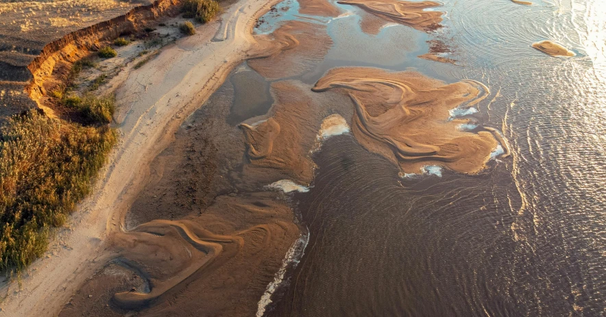 an aerial view of the sand banks and shoreline