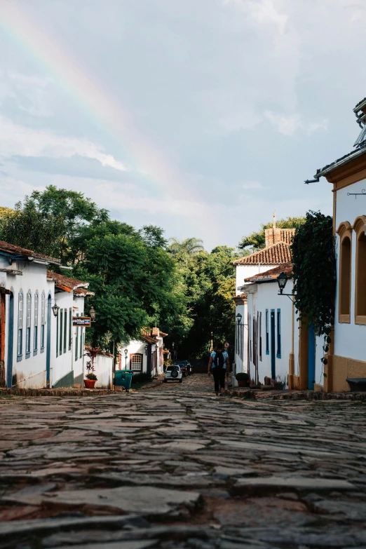 a street that has some buildings and people in it