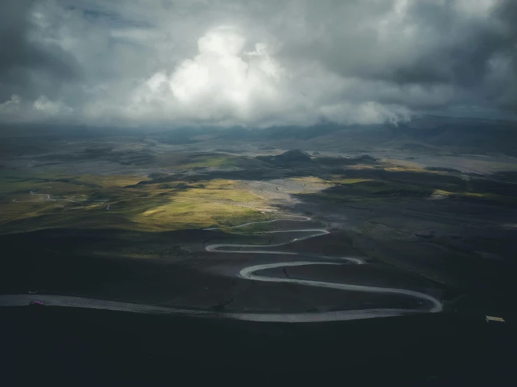 an aerial view of an area with a river