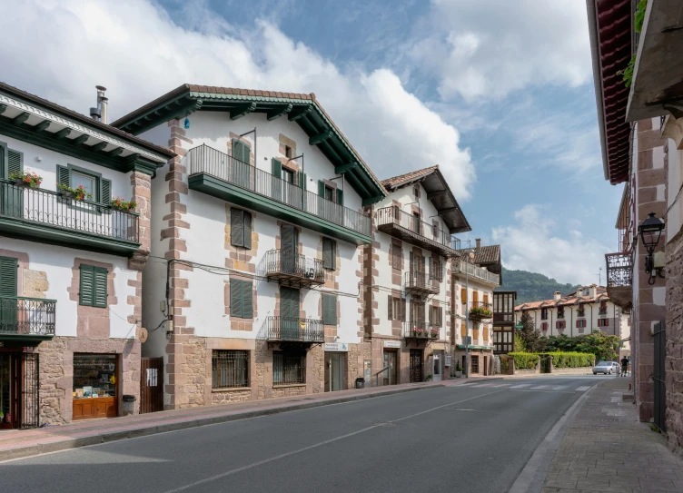 a street view in front of several buildings