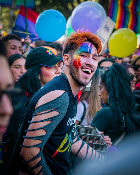 a man with red hair, dressed as clown and crazy face