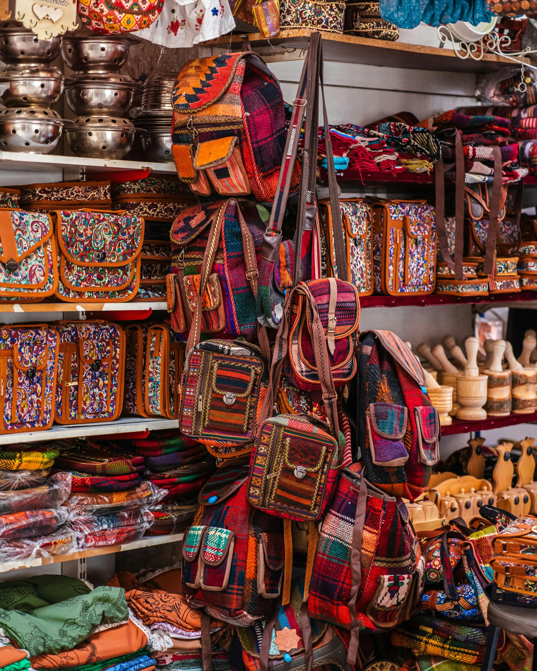 some people on a street market with some baskets