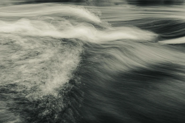 waves crashing in and out of the ocean