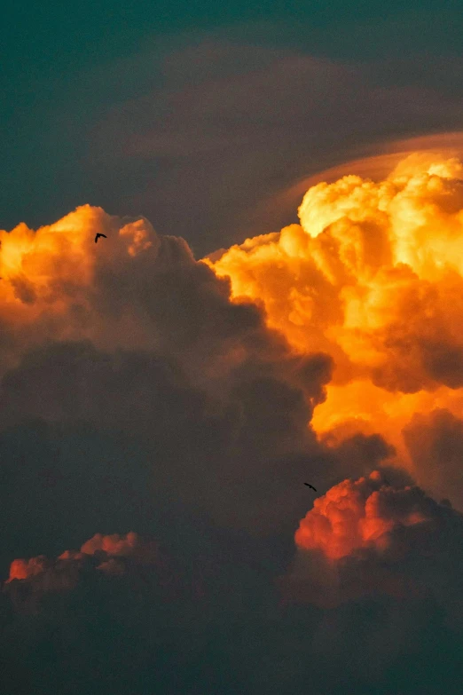 a picture of an odd shape of clouds in the sky