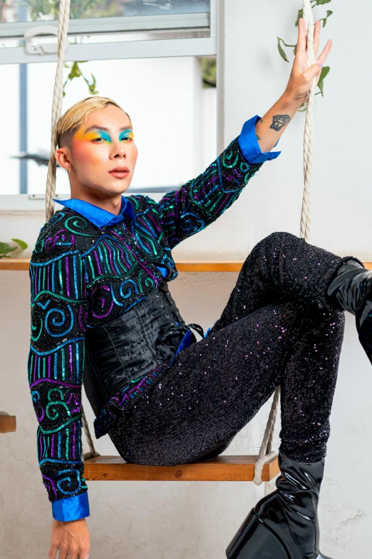 a girl with body paint sitting on a porch swing