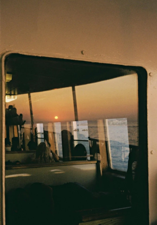 there is a picture of an ocean from inside a boat
