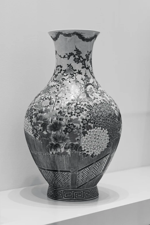 the large vase is displayed with decorative patterns