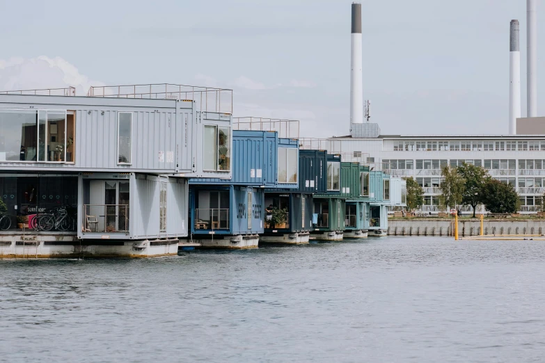 a row of buildings that are over looking the water