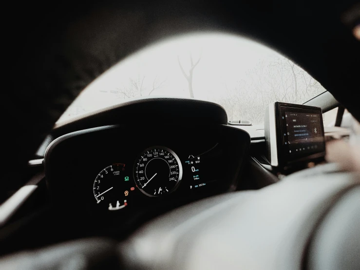 an image of inside of the driver's seat in a vehicle