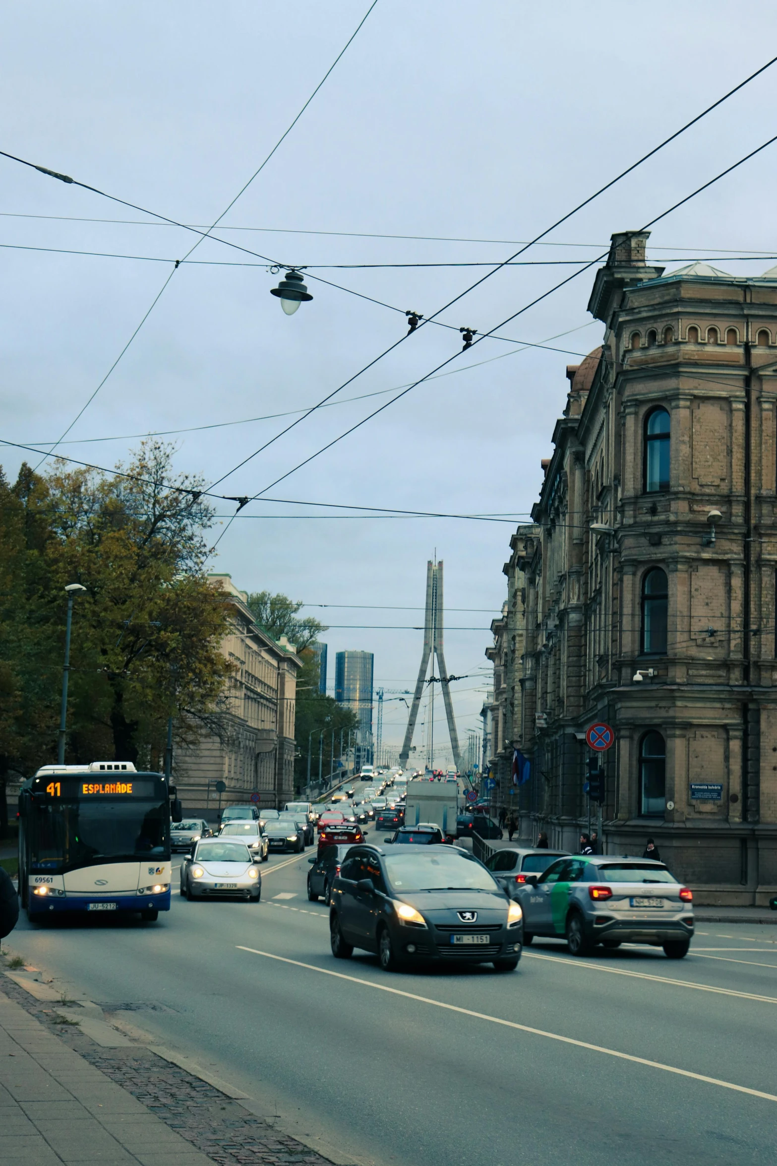 a busy city street with traffic and cars