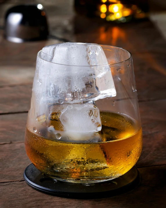 a glass of ice sits on the table