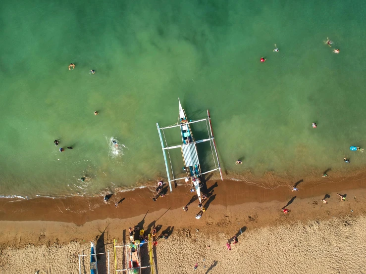 an overhead view of the beach and ocean