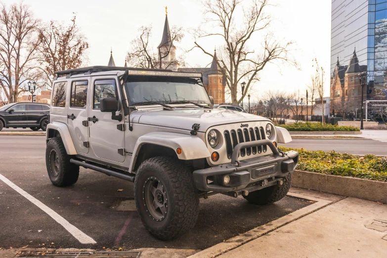 jeep on the side of a city street