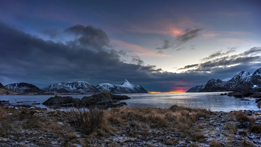 a beautiful view of the sunset over water